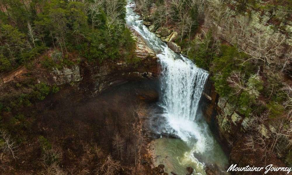 Lula Falls surrounded by forest and rock cliffs at Lula Lake Core Preserve