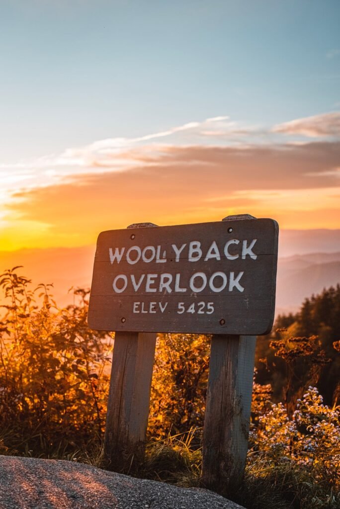 Wooden overlook sign on the Blue Ridge Parkway near Asheville at sunset